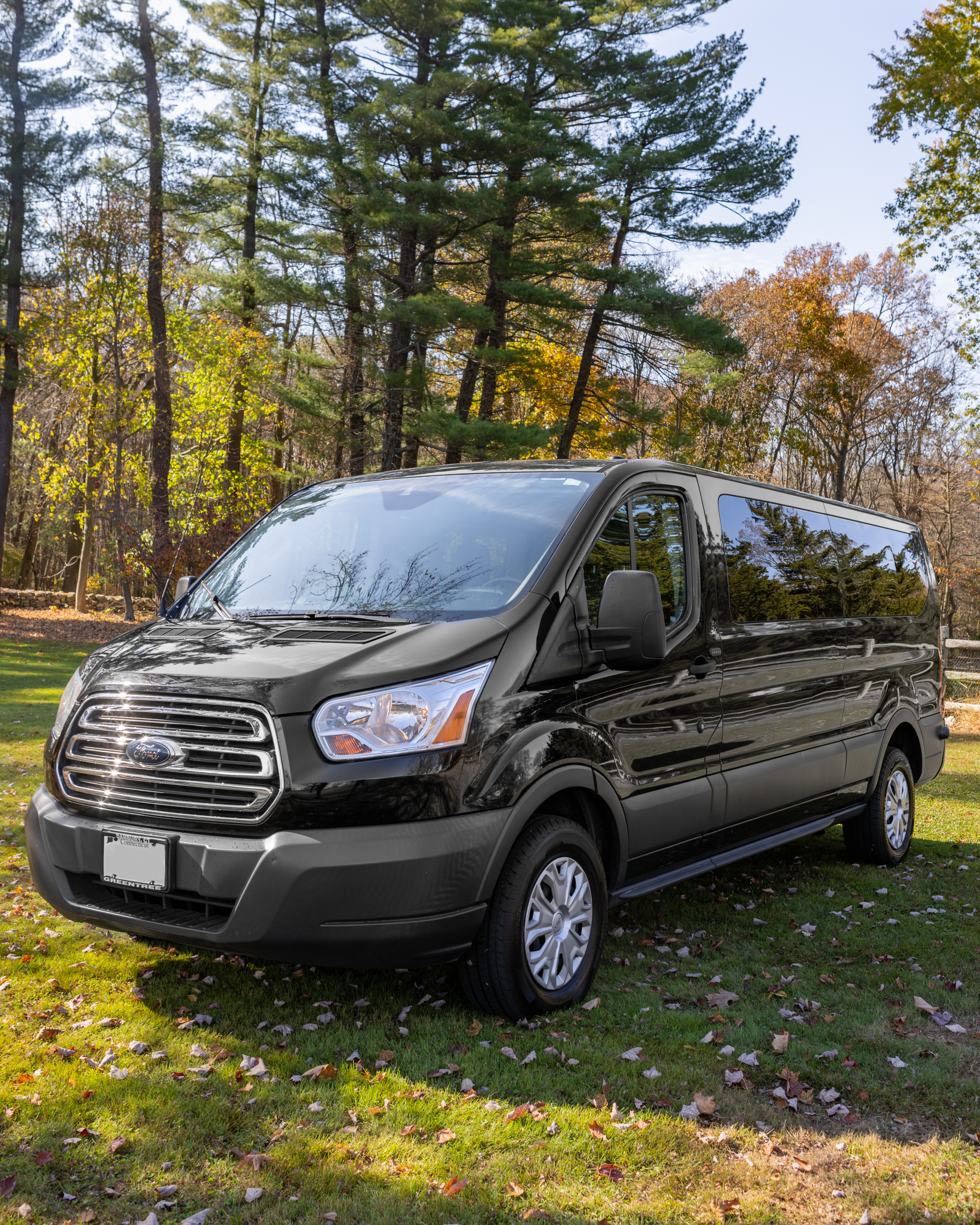 TravelSeats 12–15 passenger Ford Transit van